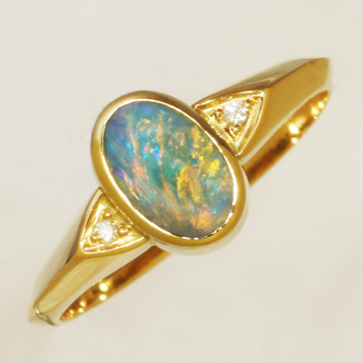 18k Yellow Gold Ring with two diamonds and a BLACK OPAL Sparkling bright orange and green over blue